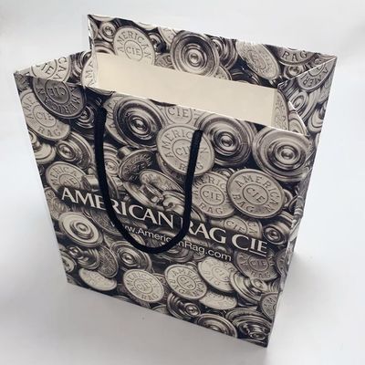 Prezzo buono Il regalo di carta stampato abitudine dell'OEM insacca l'incisione Pritning conveniente portare in linea