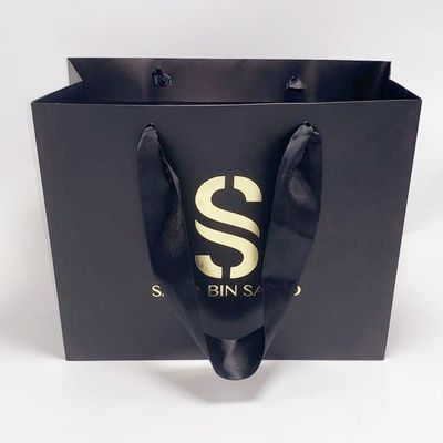 Prezzo buono Sacchetti della spesa di carta stampati abitudine di seta nera squisita della maniglia della borsa della carta kraft in linea