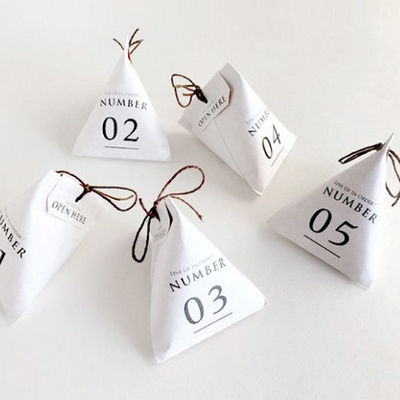 Prezzo buono Le borse riciclate del regalo della carta kraft Hanno personalizzato le borse metalliche di Candy della stagnola con la corda in linea